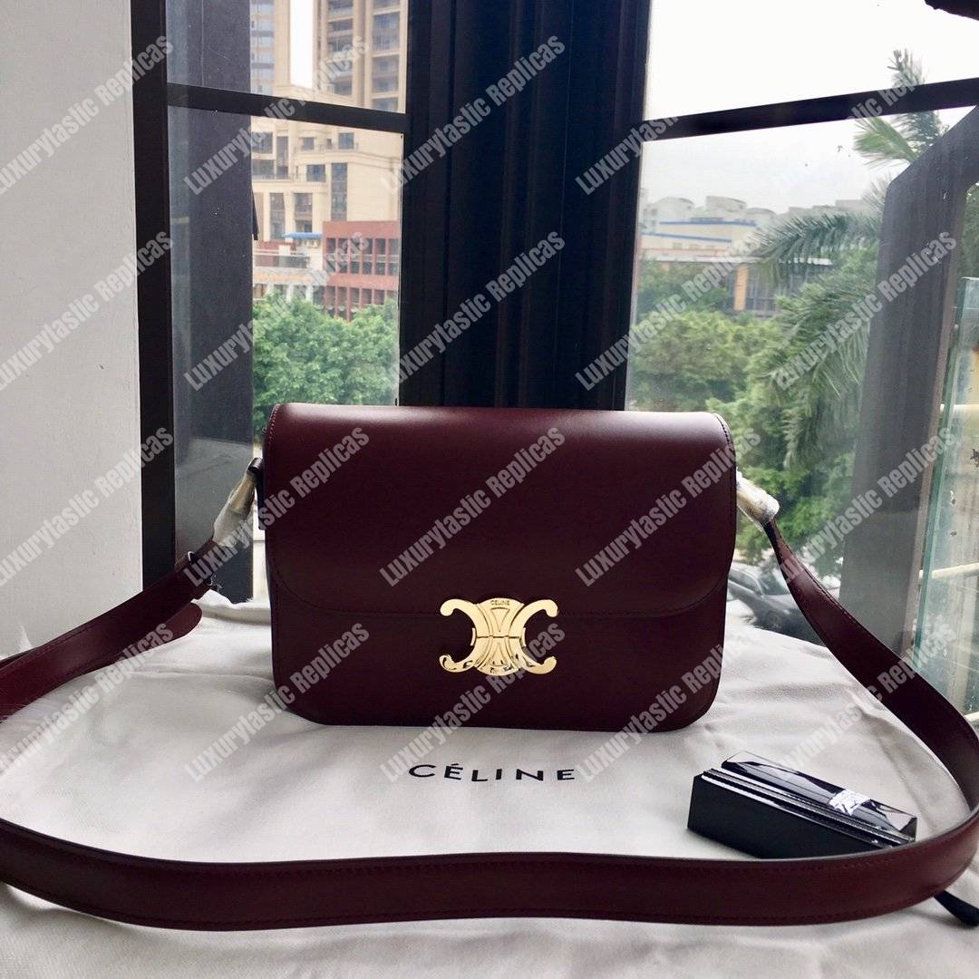 Ce**e medium triomphe bag in shiny calfskin burgundy