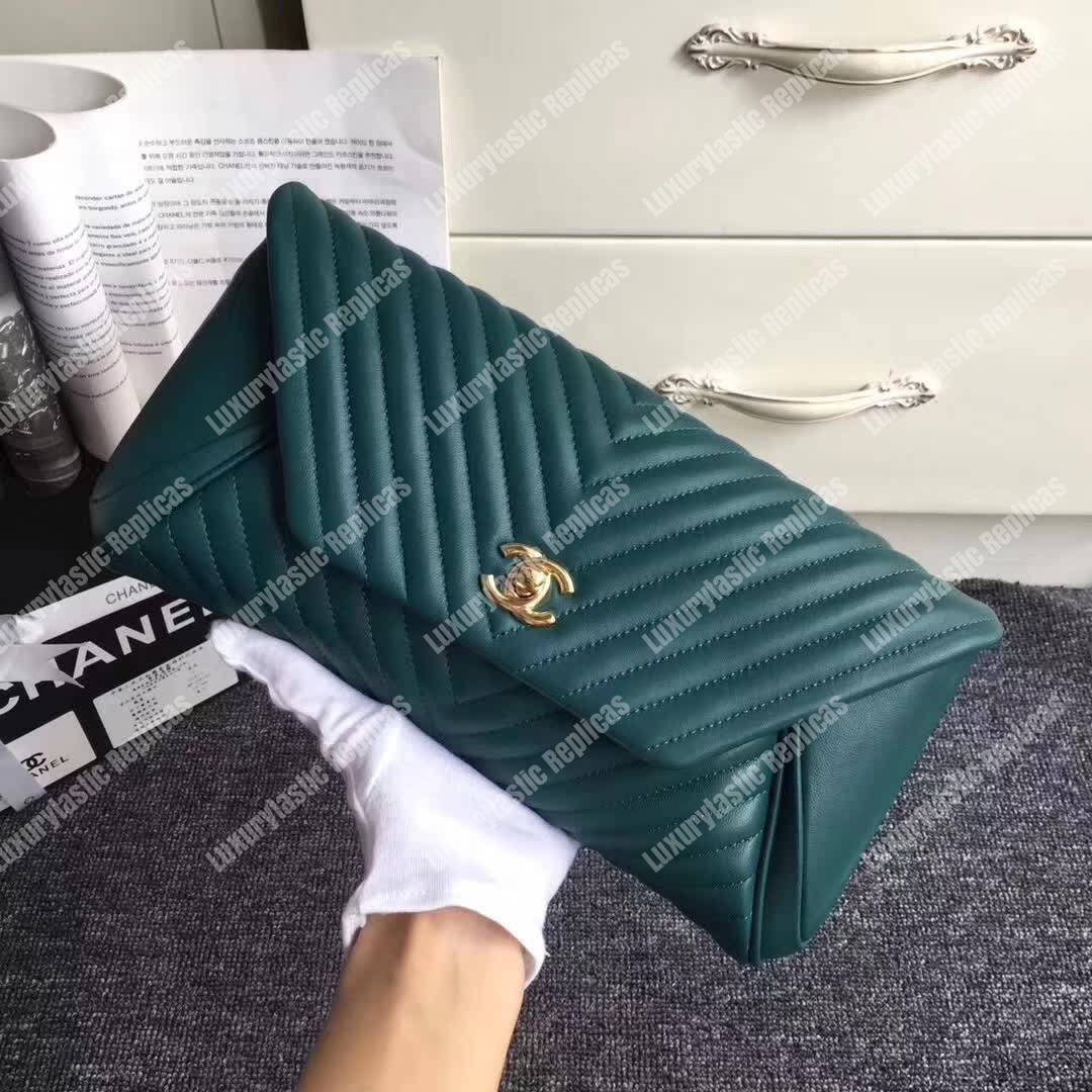 Ch*el reversed clutch green