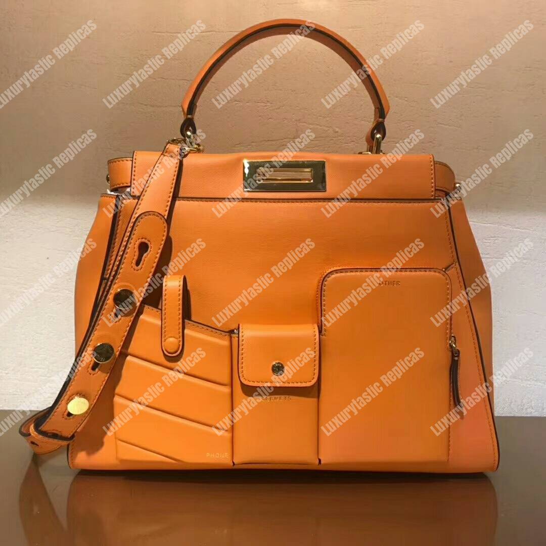 F**di peekaboo iconic medium orange leather bag