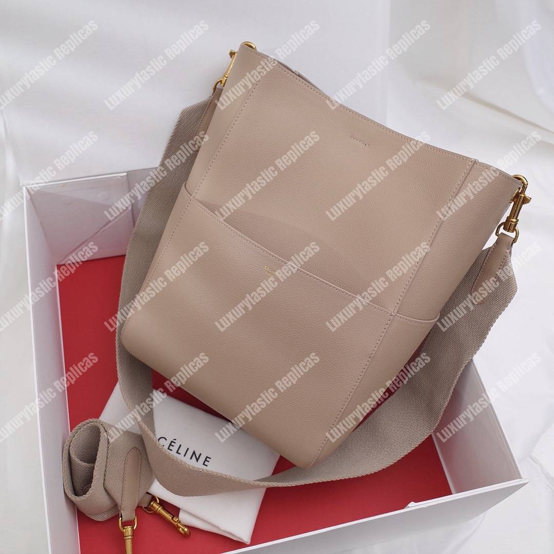 Ce**e sangle bucket bag in soft grained calfskin taupe