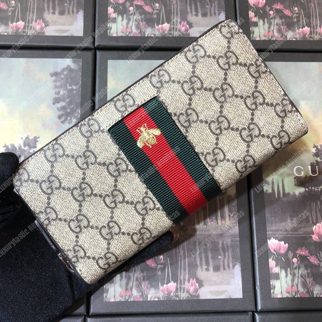 G*u*i web gg sup*e zip around wallet bee