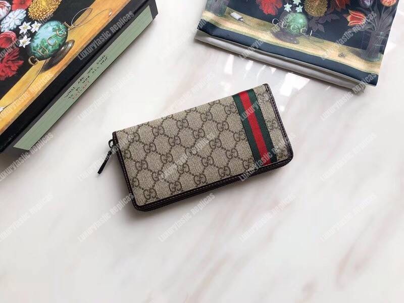 G*u*i gg sup*e zip around wallet with web