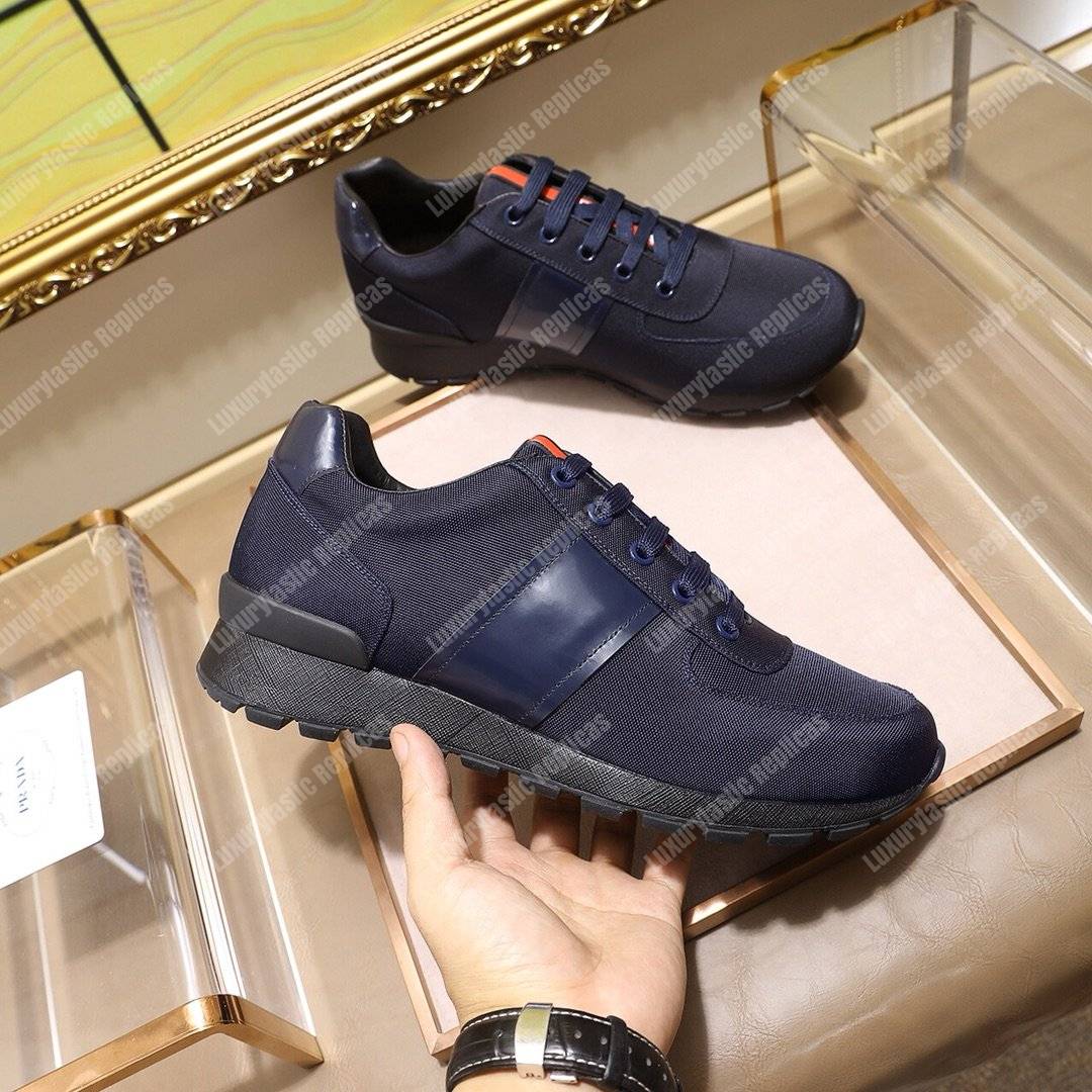 Pra*a fabric and leather sneakers dark blue