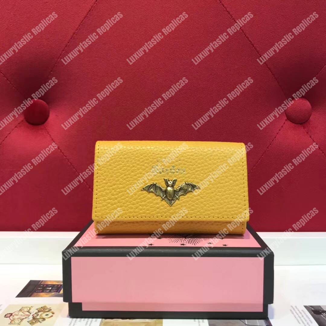 G*u*i garden leather key case yellow with bat