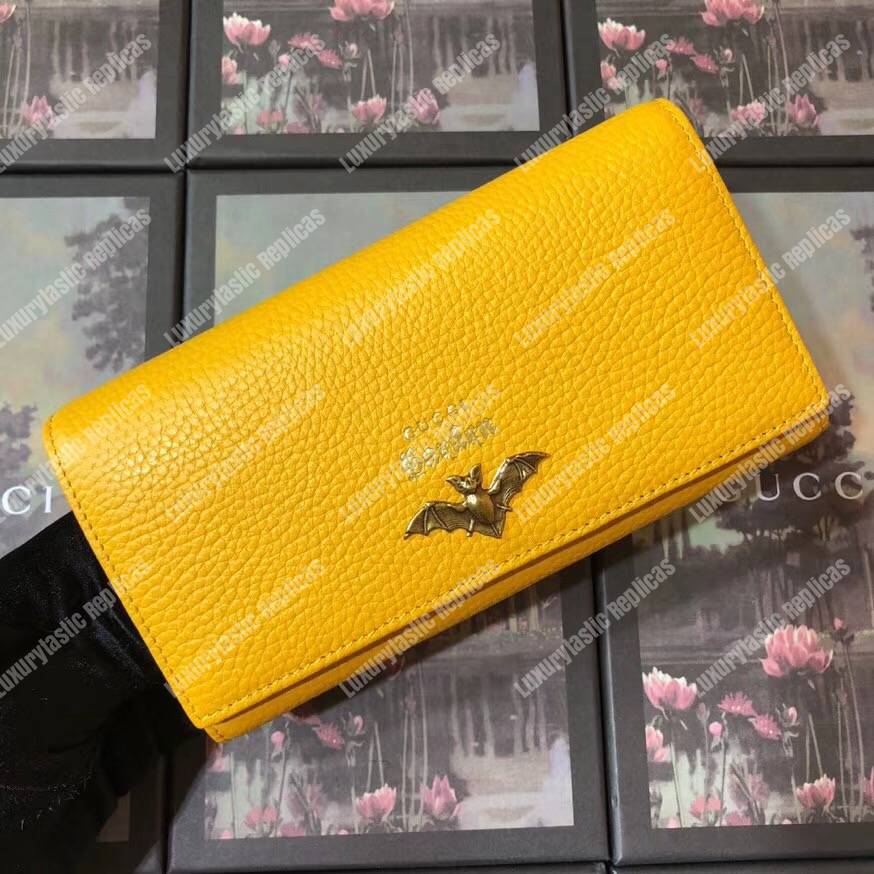 G*u*i garden leather continental wallet yellow with bat