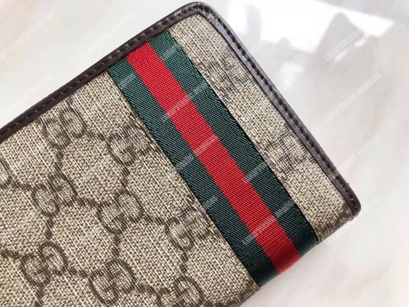 G*u*i gg sup*e zip around wallet with web