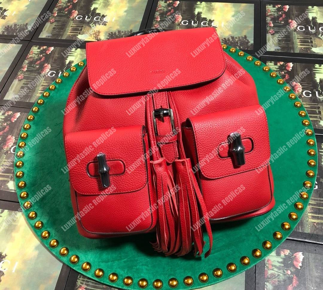 G*u*i leather bamboo tassel backpack hibiscus red