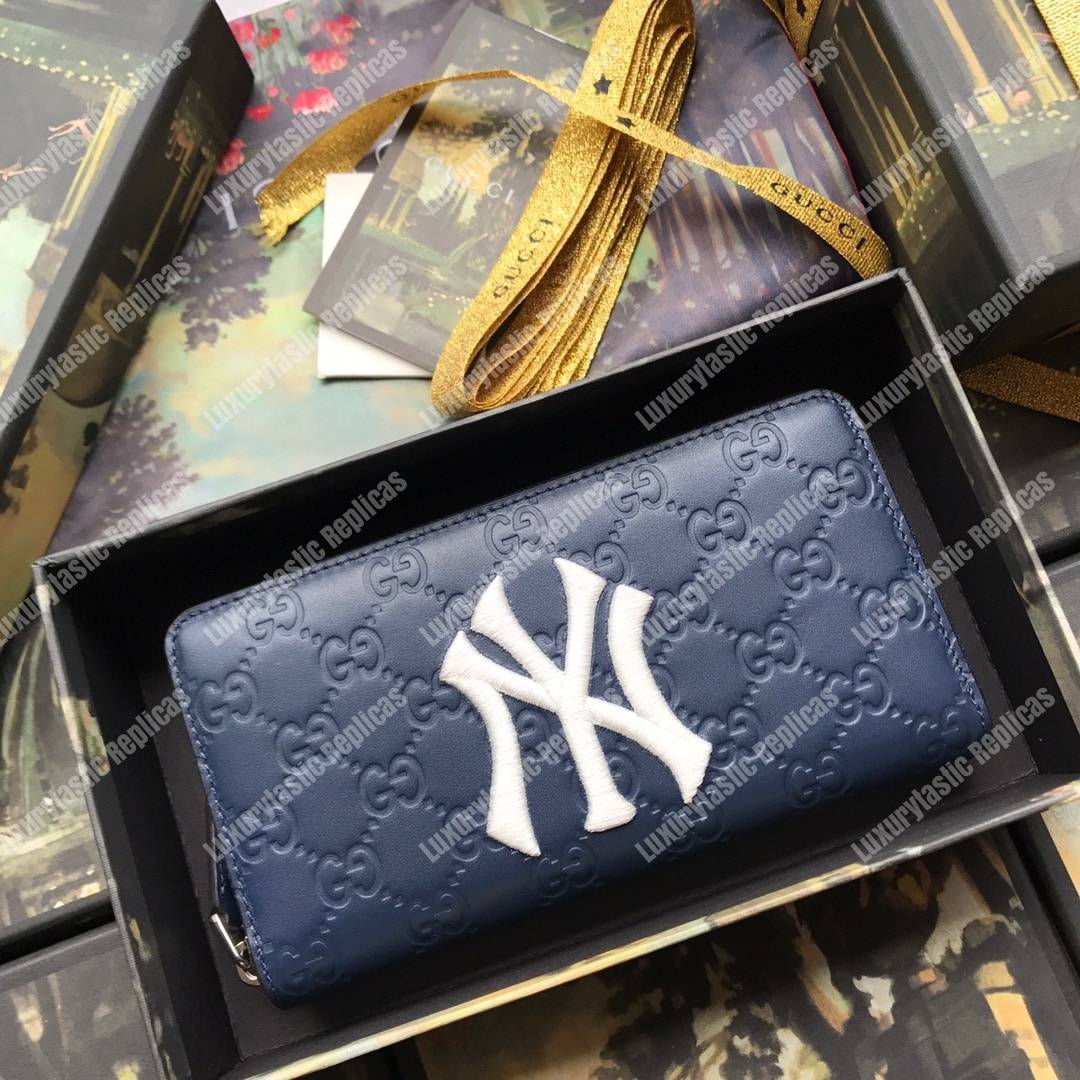 G*u*i blue zip around wallet with ny yankees™ patch