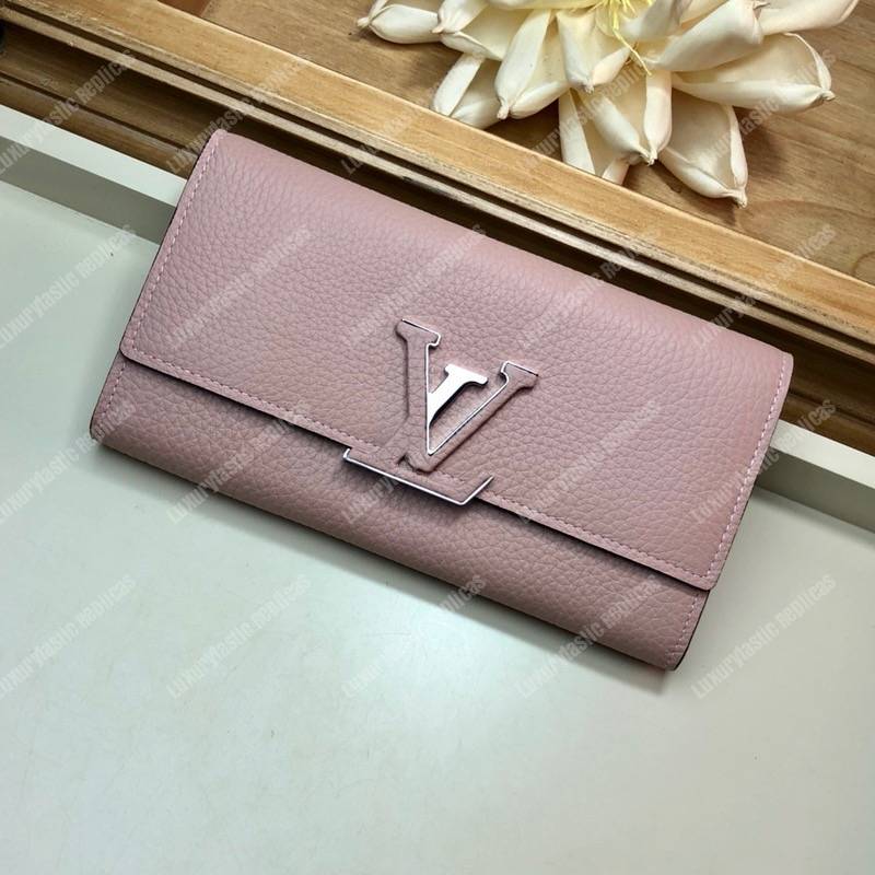 LV Capucines Wallet Taurillon Magnolia