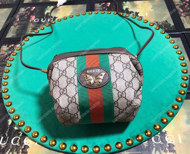 G*u*i mini gg bag with web and butterfly