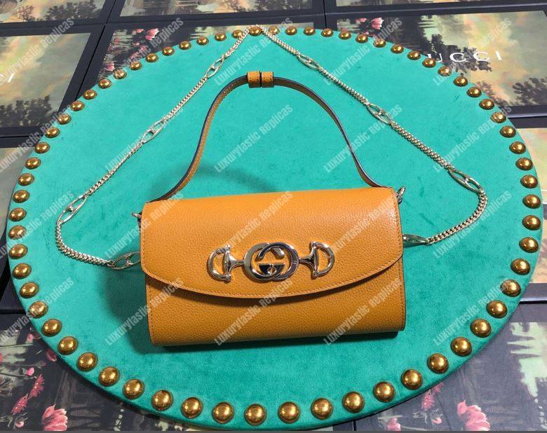 G*u*i zumi yellow smooth leather mini bag